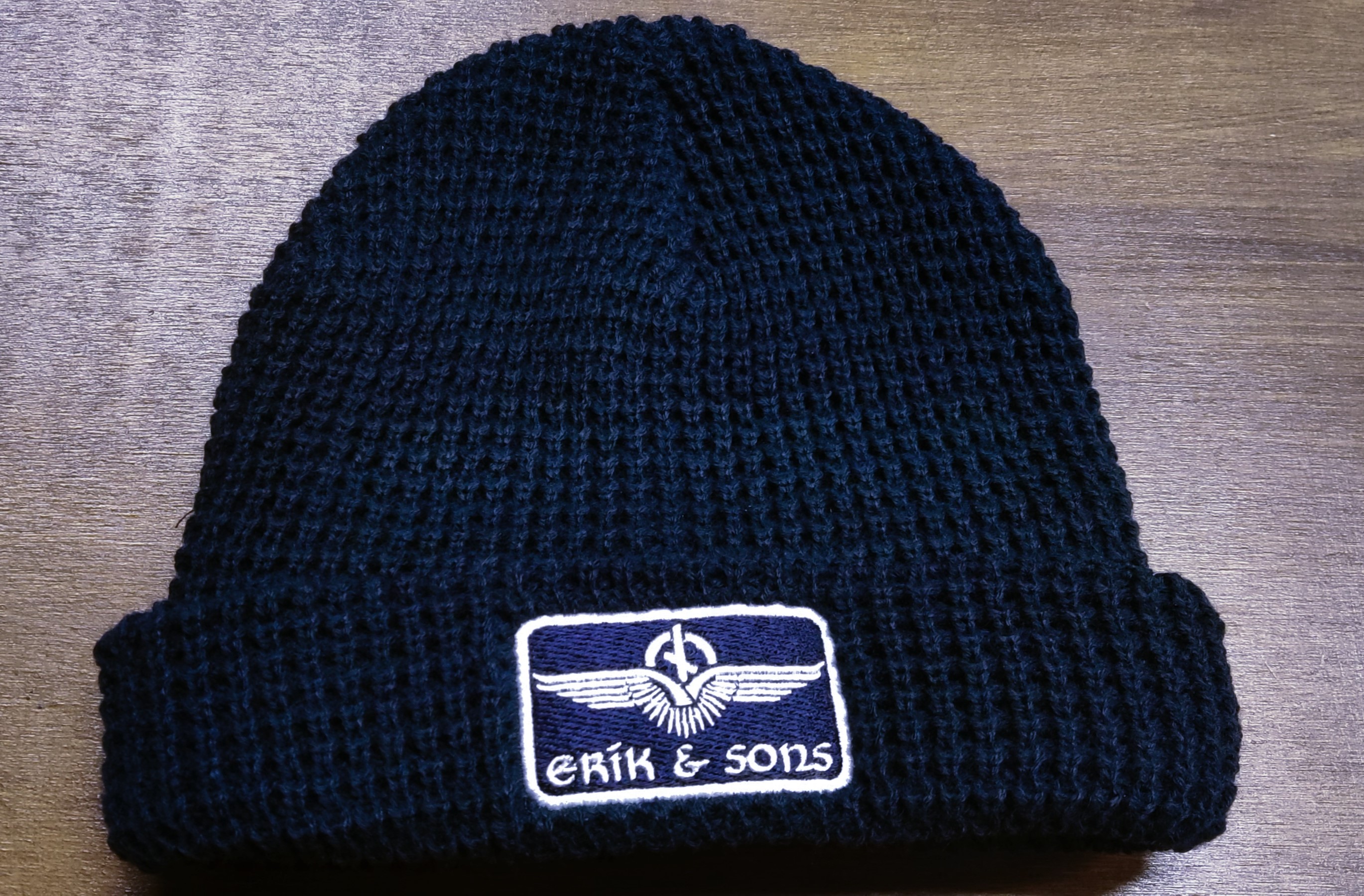 ШАПКА ВЯЗАННАЯ БУКЛЕ Erik and Sons
